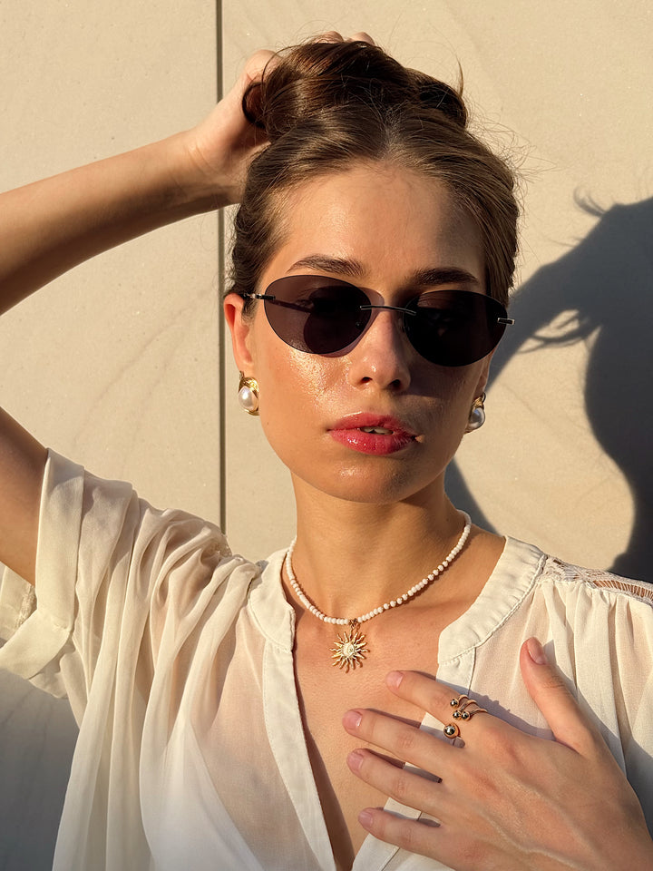 Сережки «Вінтаж» з перлиною в золотому обрамленні